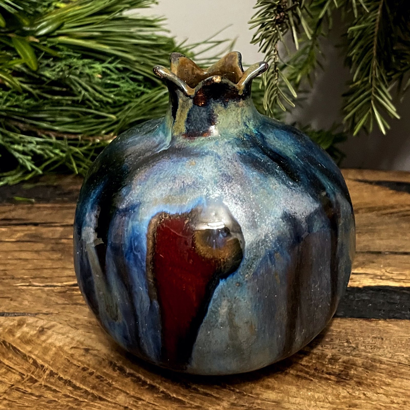 Ceramic pomegranate vase with blue and red glaze