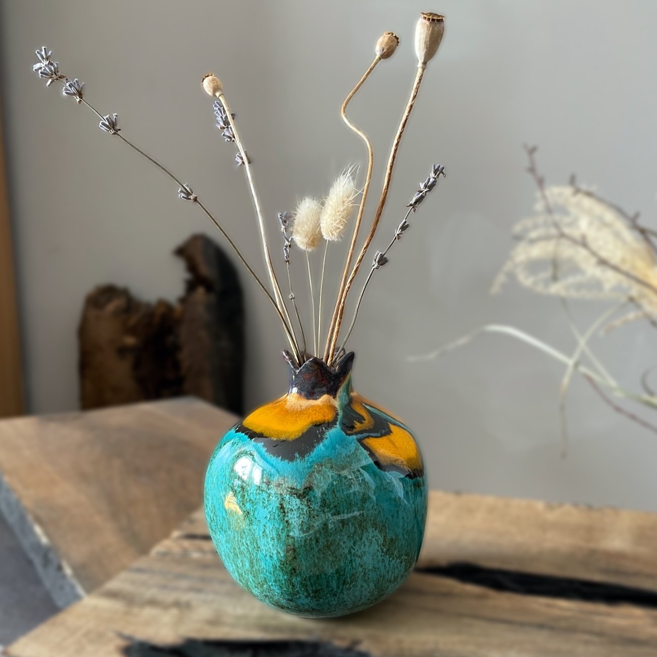 ceramic pomegranate vase with dried stems, turquoise and yellow glaze, handmade pottery decor