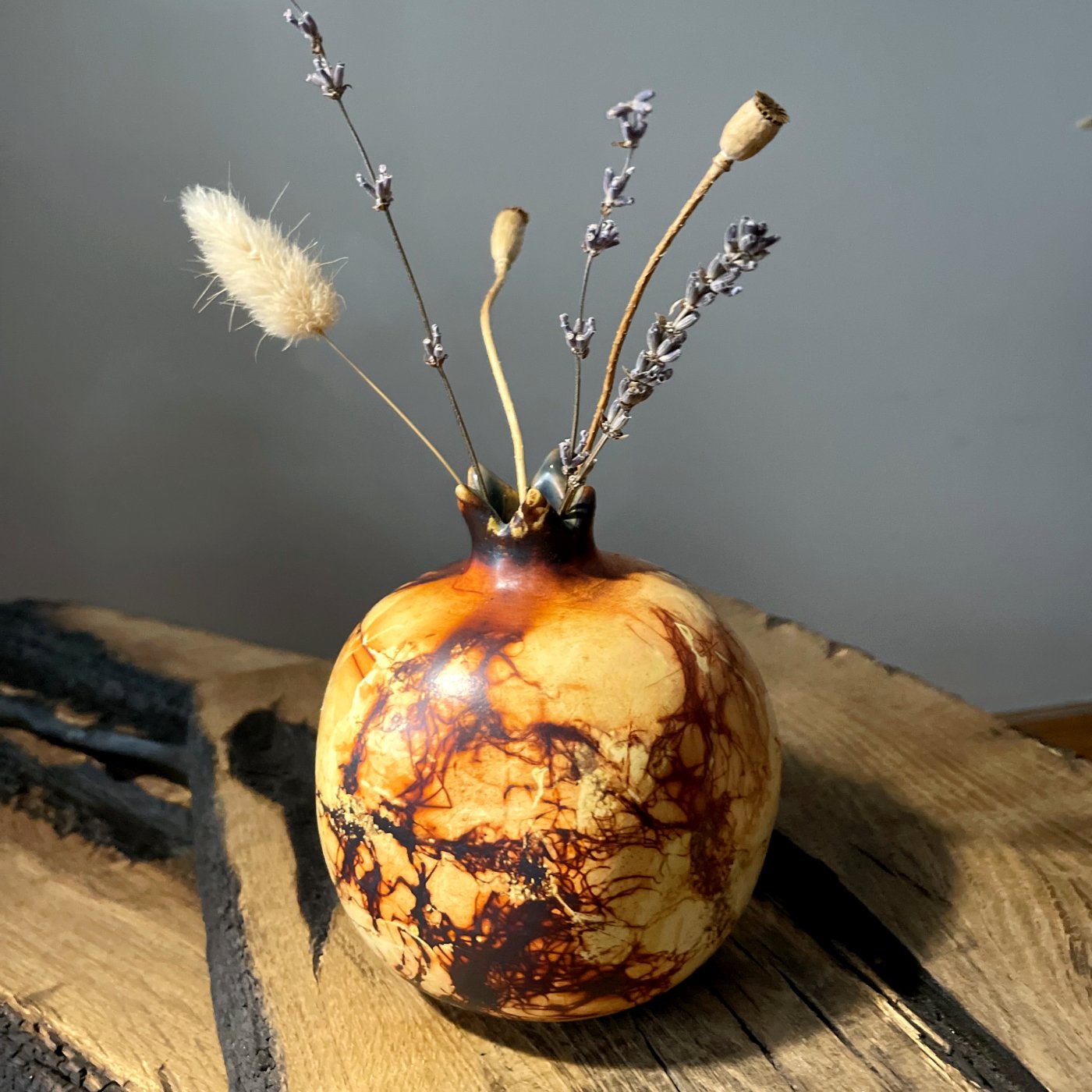 pottery pomegranate vase with unique firing texture